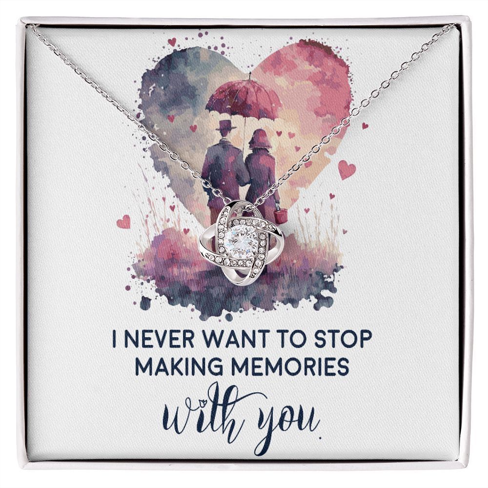 Never Stop Making Memories Infinity Knot CZ Necklace Silver Tone Standard Box